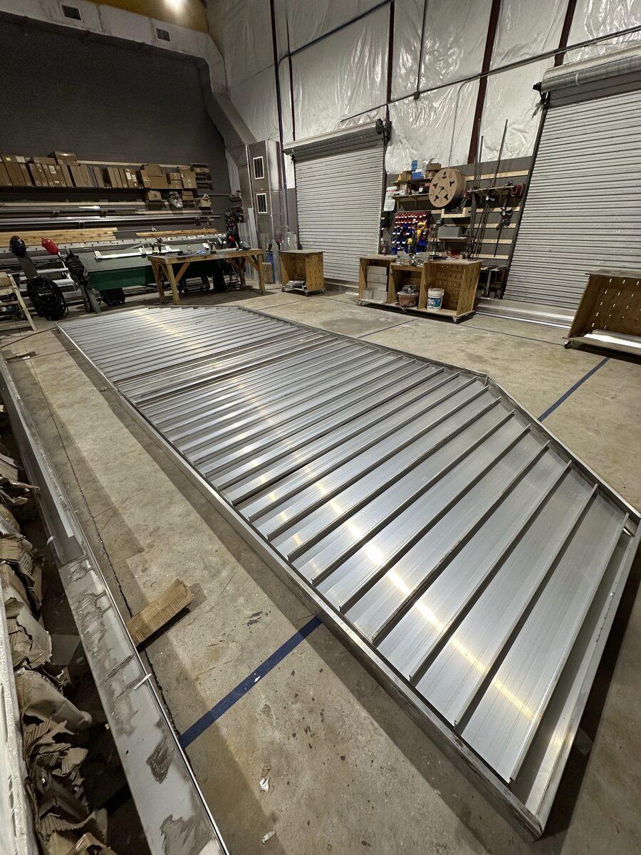 Fabricated large aluminum flat metal canopy for marquee — CG Signs