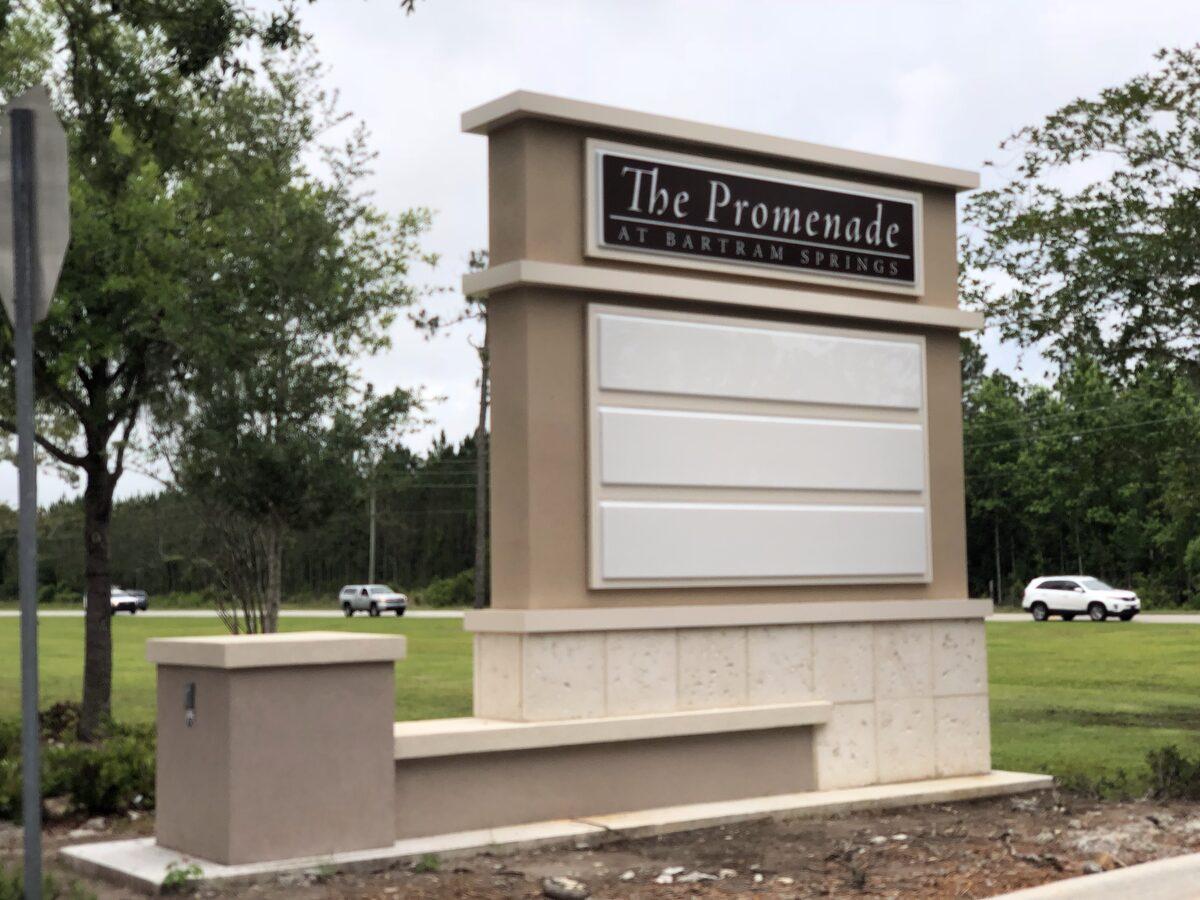 Custom fabricated internally illuminated aluminum monument sign with stucco finish — Custom Graphics & Sign Designs