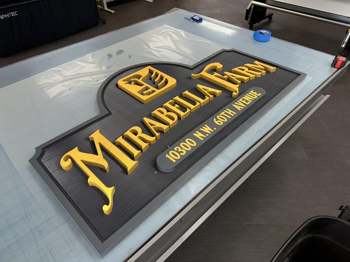 Carved HDU sign with raised letters and reflective vinyl accents — CG Signs Jacksonville FL