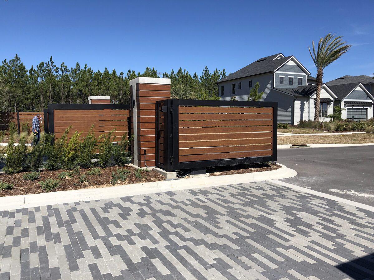 Fabricated aluminum gates with Knotwood slats for Edison by Toll Brothers at eTown, Jacksonville FL — by CG Signs