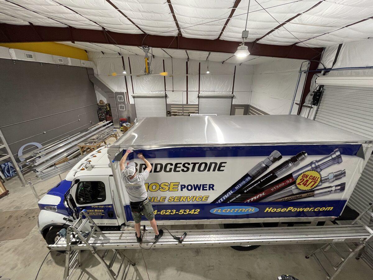 Box truck wrap installation for Bridgestone HosePower by CG Signs