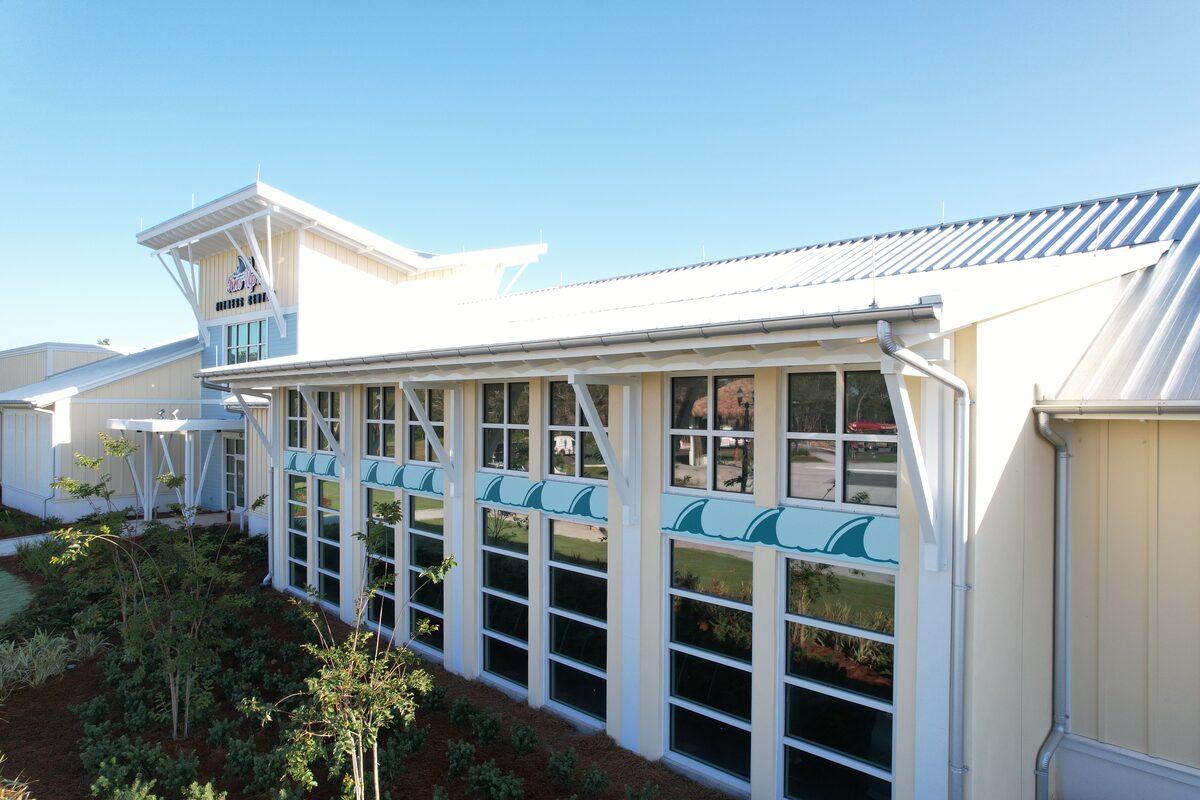 Aerial view of custom aluminum outrigger brackets fabricated by CG Signs at the Fins Up Fitness Center, Latitude Margaritaville Watersound, FL