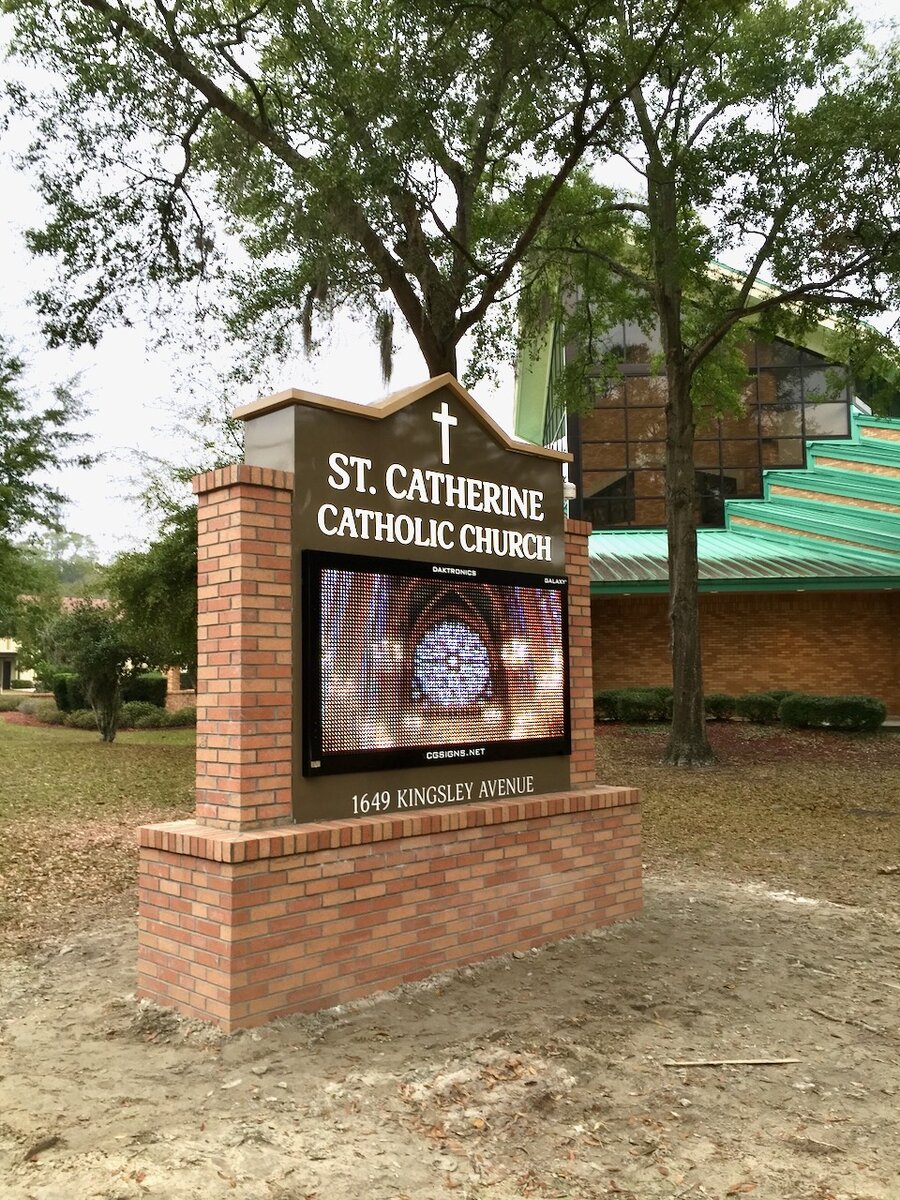 Brick masonry monument with integrated Daktronics LED display for St. Catherine Catholic Church Orange Park FL by CG Signs