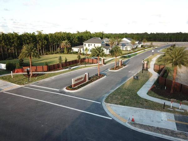 Knotwood entry features for Edison by Toll Brothers in eTown. We designed, fabricated, and installed the Monument Sign, Fencing, Columns, and Gates — Custom Graphics & Sign Designs