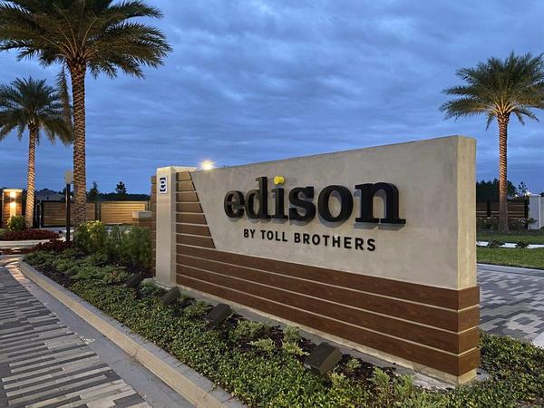 Night view of Edison by Toll Brothers in eTown — Custom Graphics & Sign Designs