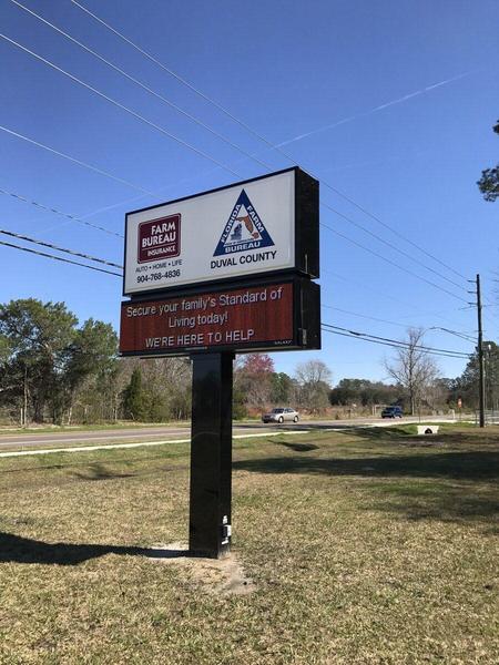 Pylon Sign with Daktronics LED Display for Farm Bureau on Dunn Avenue — Custom Graphics & Sign Designs