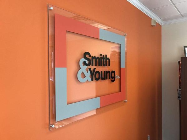 Interior Reception sign made of Clear Acrylic with Matte Finish vinyl graphics — Custom Graphics & Sign Designs, Orange Park FL