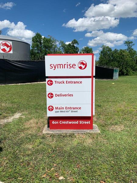 Custom fabricated directional monument signs for symrise in Jacksonville, FL — Custom Graphics & Sign Designs