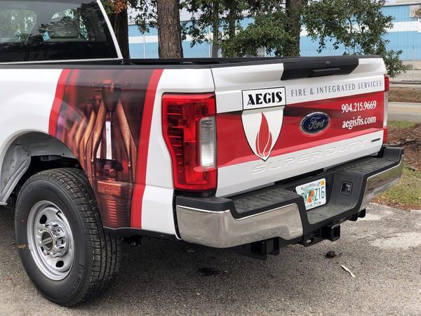 Partial wrap for Ford F-250 — Custom Graphics & Sign Designs, Jacksonville FL
