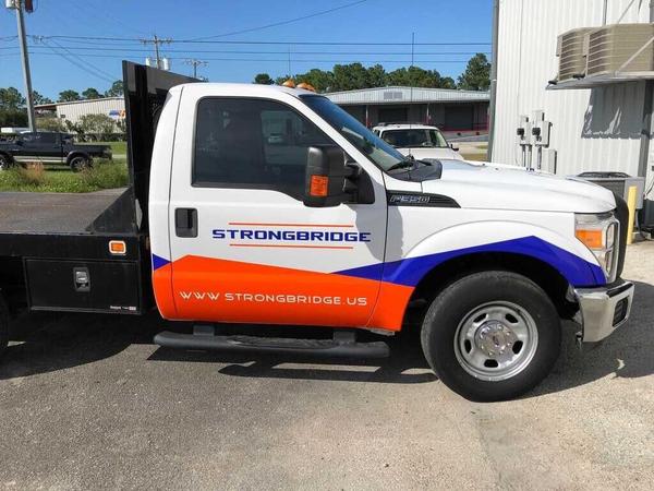 Partial wrap on Ford F-250 — Custom Graphics & Sign Designs, Jacksonville FL