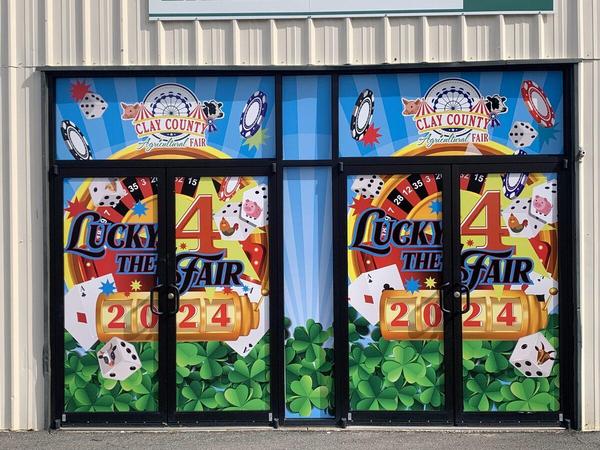 Storefront Window Wrap for Clay County Fairgrounds — Custom Graphics & Sign Designs