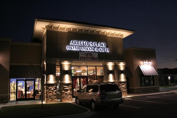 Halo-illuminated (reverse-illuminated) flush-mounted channel letters for Arlette’s Place Home Decor & Gifts — Custom Graphics & Sign Designs, Jacksonville FL